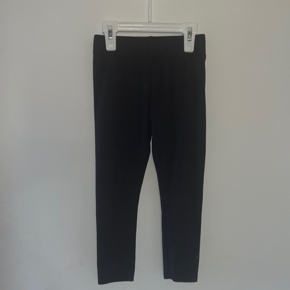 Girl’s black leggings (size: 4)